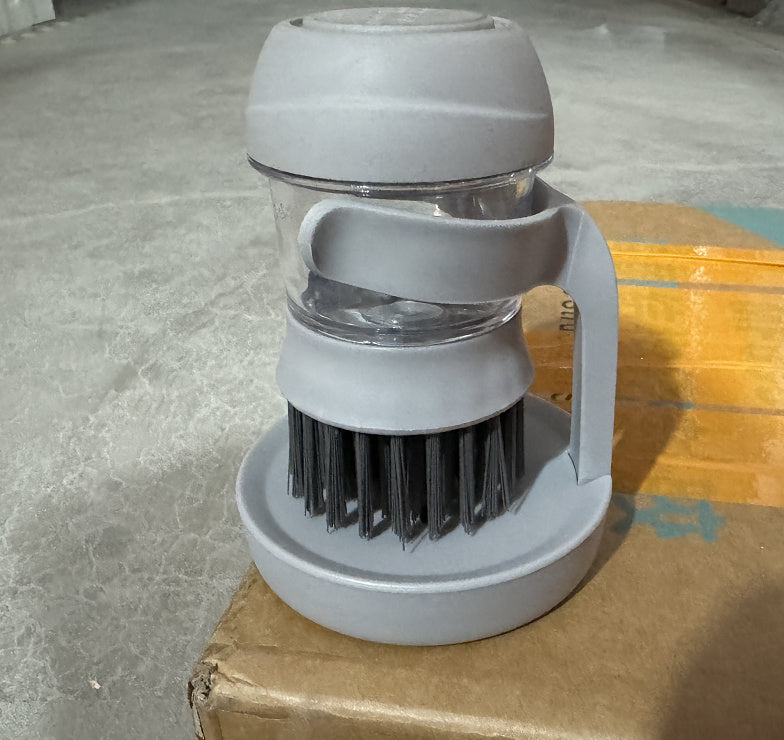 Soap-Dispensing Palm Brush